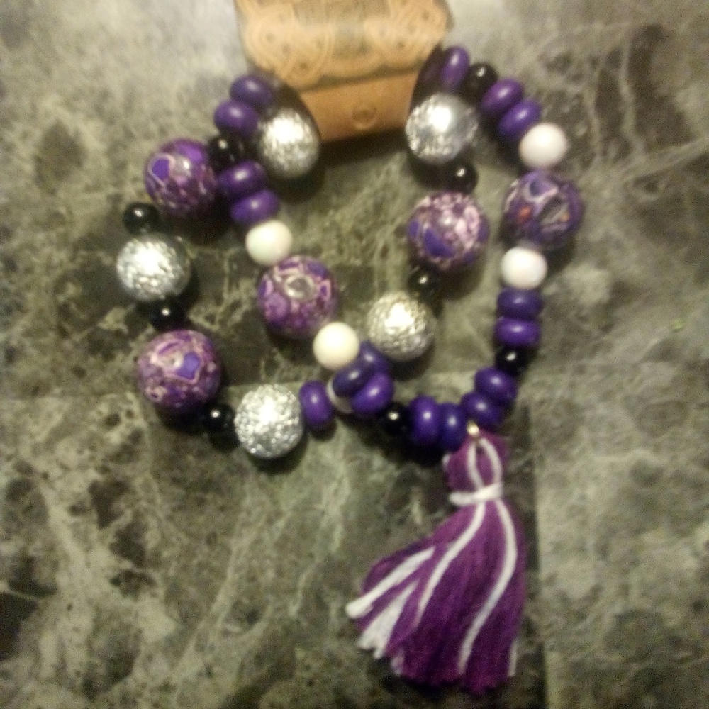 Twin pack of purple tassel bracelets